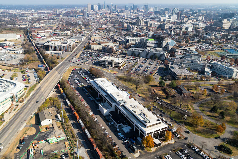 aerial shot of nashville with an emphasis on the HCA Healthcare building's roof