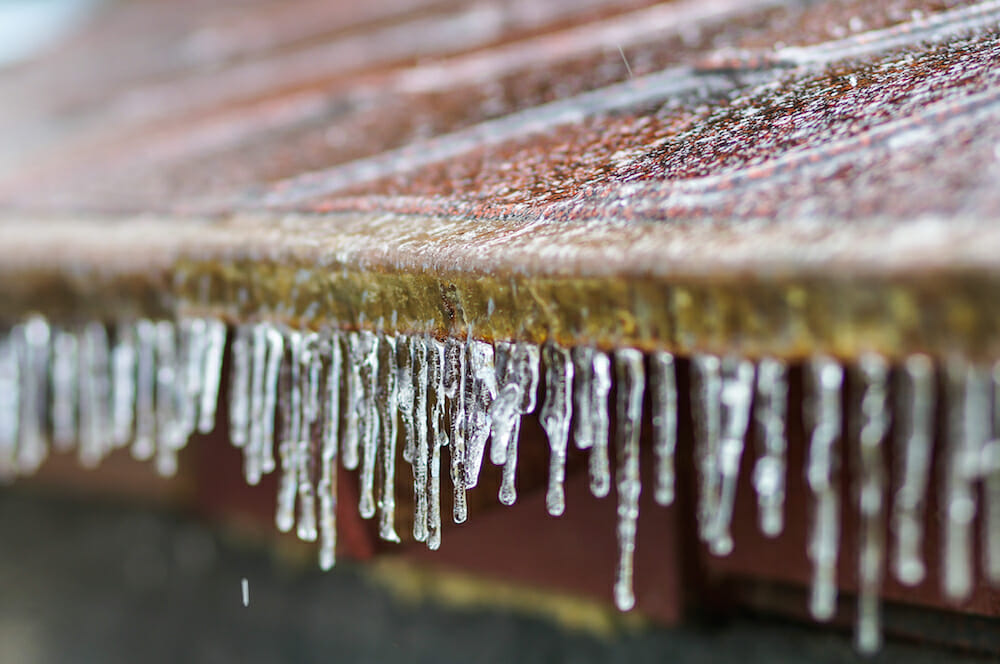 North Alabama Winter icicles hanging off the edge of a roof