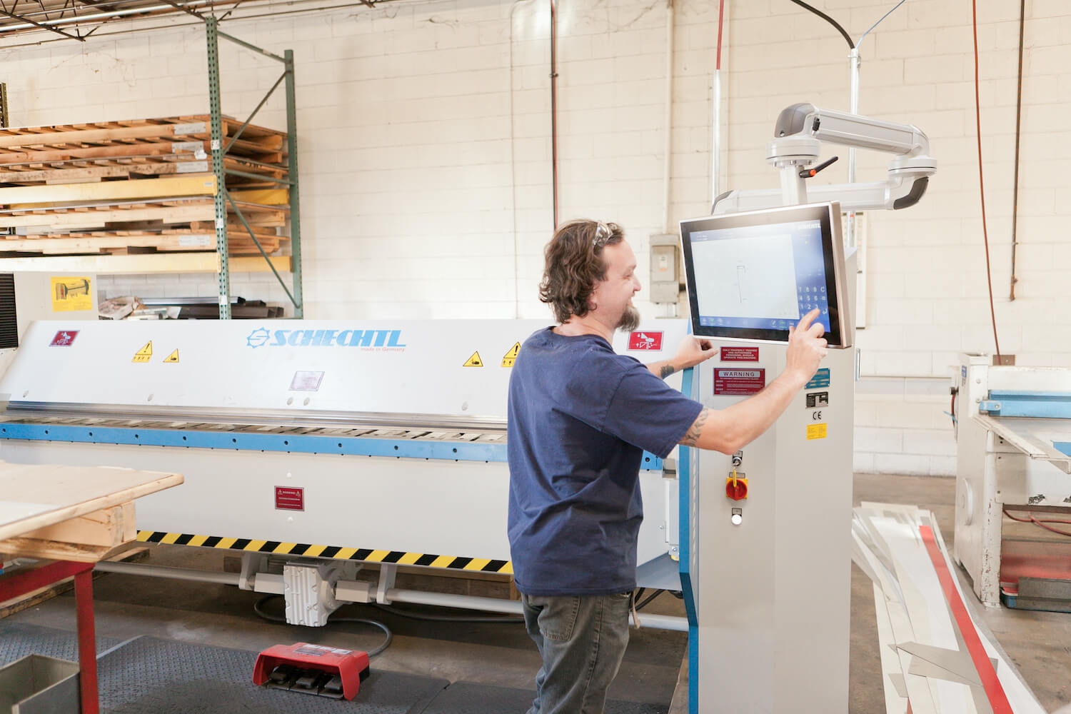 maxwell worker in process of fabrication analyzing computer monitor