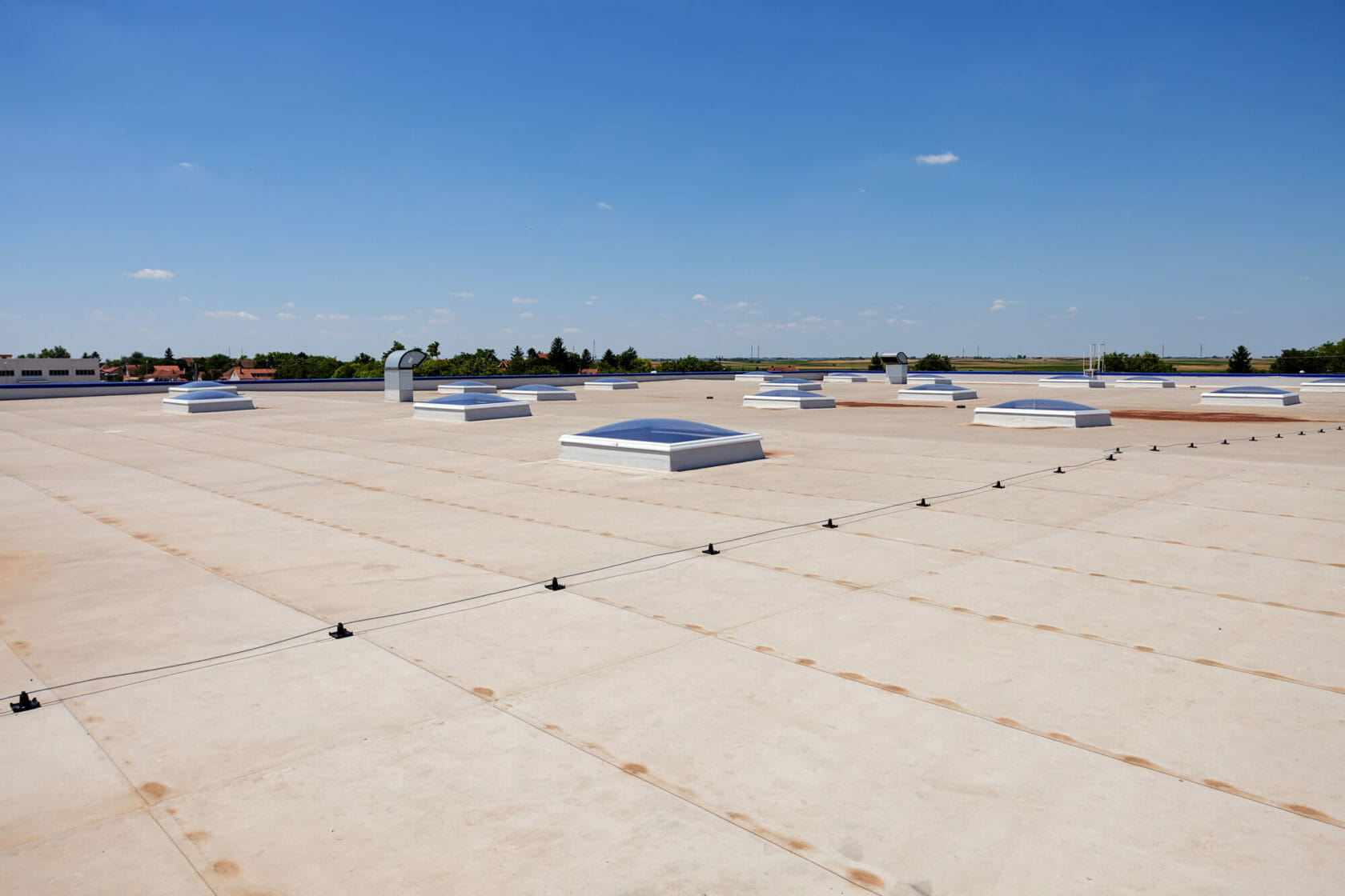 skylights scattered across commercial roof