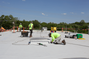 maxwell roofers installing curb on commercial roof