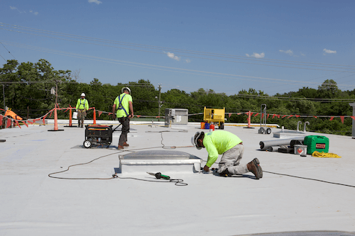 maxwell roofers installing curb on commercial roof