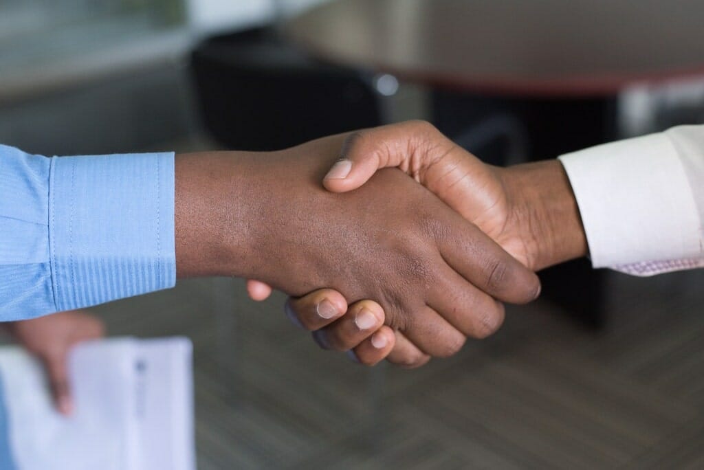 handshake between business men