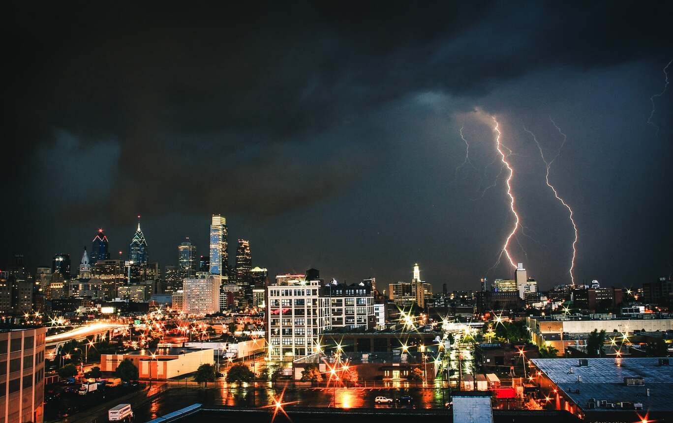 city skyline with storms.