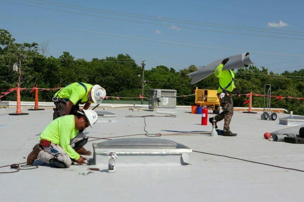 maxwell roofers installing a roof.