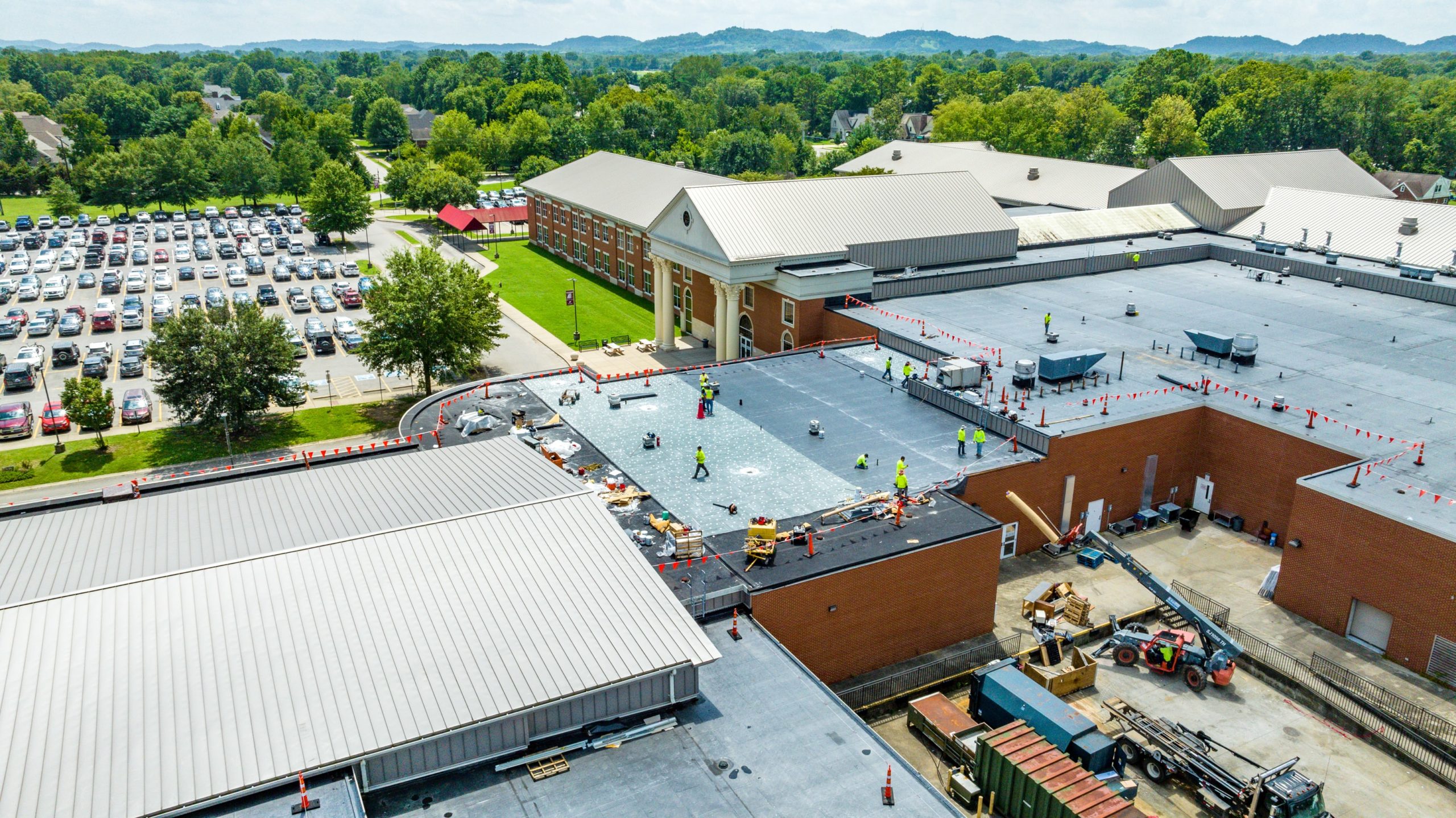 aerial view of a commercial roof on a sunny day.