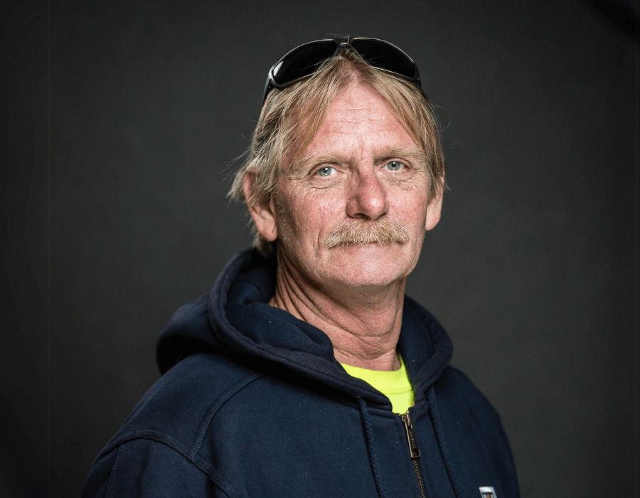 Professional portrait of Tim Cox.